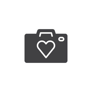 Heart camera vector icon. filled flat sign for mobile concept and web design. Photo camera with heart simple solid icon. Love photo symbol, logo illustration. Vector graphics