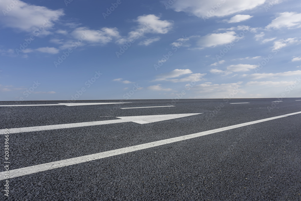 Wall mural empty highway asphalt road and beautiful sky landscape