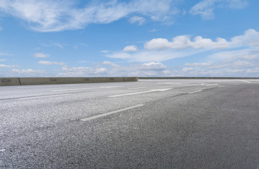 Empty highway asphalt road and beautiful sky landscape