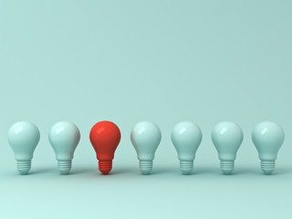 Think different concept , One red light bulb standing out from the green incandescent lightbulbs on green pastel color background , leadership and different creative idea concept. 3D rendering.