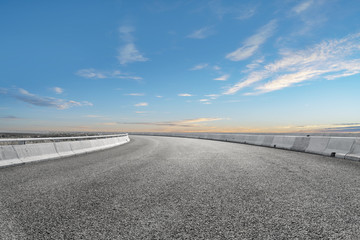 Empty highway asphalt road and beautiful sky landscape