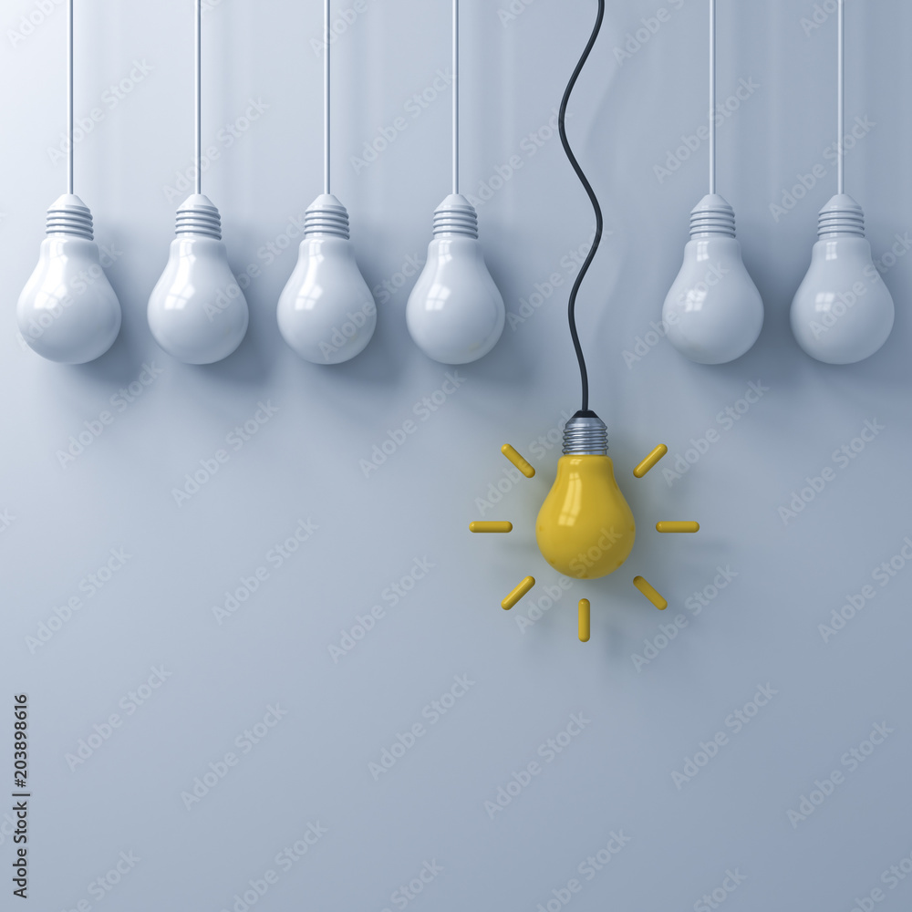 Leinwandbilder one hanging yellow idea bulb standing out from the dim unlit light bulbs on white wall background , 