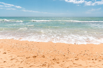 Sandy beach and turquoise ocean