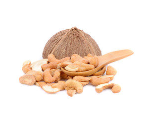 salted cashew nut in wooden spoon isolated on white background