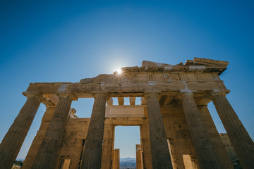 Sun at the Erechtheum temple in Acropolis at Athens, Greece