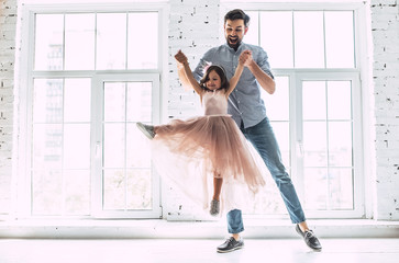 Dad with daughter at home