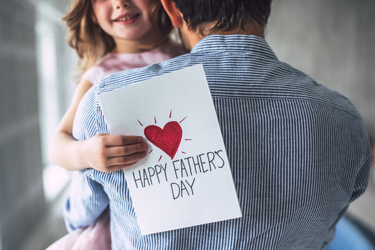 Dad with daughter at home