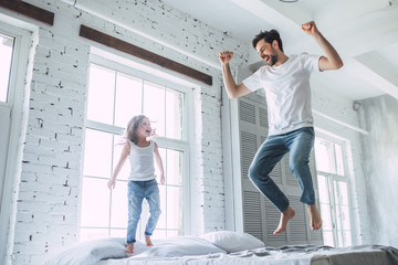 Dad with daughter at home