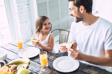 Dad with daughter at home