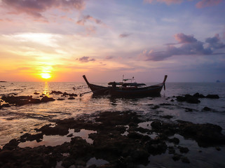 Sunset and Boat at Koh Bulone island, Panka Yai beach, Satun Thailand