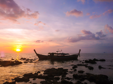 Sunset and Boat at Koh Bulone island, Panka Yai beach, Satun Thailand