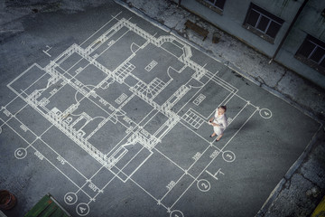 Woman engineer thinking over his plan. Mixed media