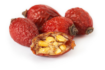 Dried dog rose fruit (Rosa canina) isolated on white background