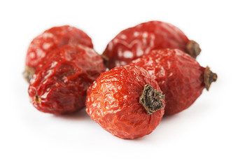 Dried dog rose fruit (Rosa canina) isolated on white background