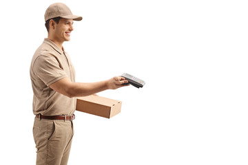 Delivery man holding payment terminal and a package