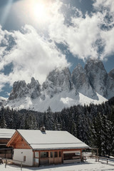 Fototapeta na wymiar House in the Dolomites. Holiday in the ski resort of northern Italy. Tour to the Dolomites.
