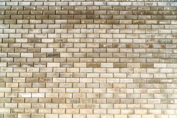 Beige bricks wall background