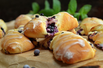 Buns with bluebeeries on paper