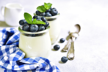 Homemade vanilla panna cotta with frash berries.