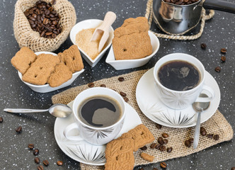 Fresh ground coffee with homemade sugar cane cookie