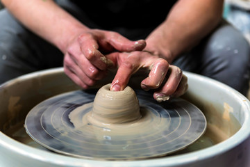Working on potter's wheel close