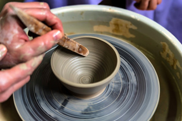 Working on potter's wheel close