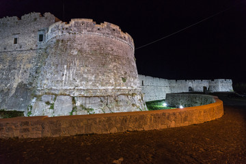 Night view of the walls and bastion of the Castle of Monte Sant'Angelo, Apulia, Italy