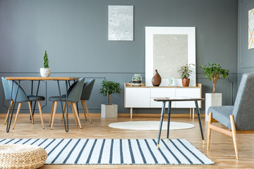 Grey interior with paintings