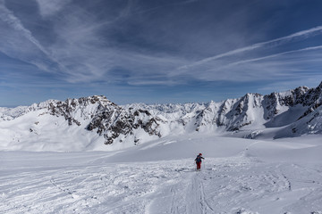 Naklejka na ściany i meble Sportler beim Skitourren gehen im Winter in den Ötztaler Alpen
