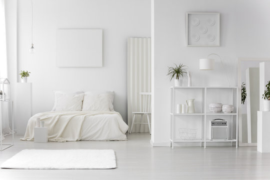 Minimal white bedroom interior
