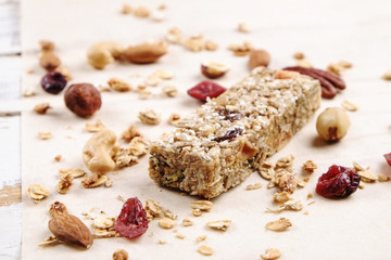 Top view of various healthy granola bars (muesli or cereal bars). Set of energy, sport, breakfast and protein bars isolated on white background