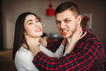 Husband and wife yelling at each other, quarrel