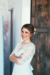 Fototapeta premium portrait of a bride in white studio