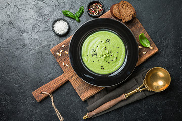 Green pea soup in bowl