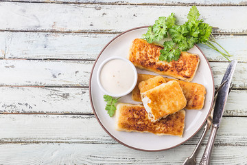 Golden fried fish fingers