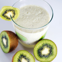 Fototapeta na wymiar Healthy milky cocktail with kiwi fruit
