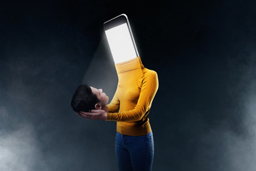 Female body with a smartphone instead of a head