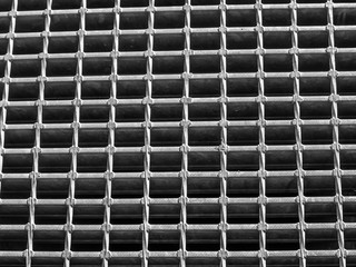 Abstract grids and dots pattern of steel drains.