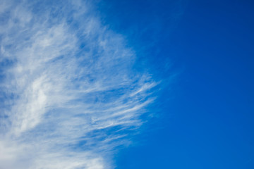 Naklejka na ściany i meble Soft clouds and blue sky, abstract white background