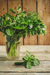 fresh greens - healthy food (fresh vegetable herbs).  Food background