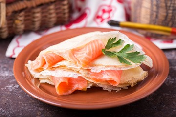 Pancakes with salty salmon