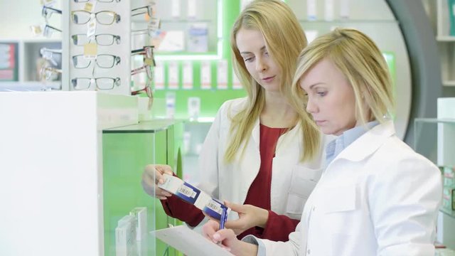 Pharmacists working together in pharmacy