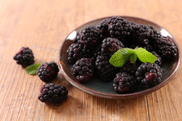 blackberry on wood background