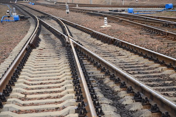 Railway line, convergence and fork of different paths.