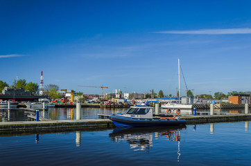 Fototapeta na wymiar MARINA - Police boat at the wharf in Kolobrzeg