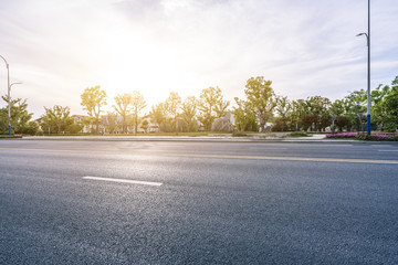 asphalt road with modern building