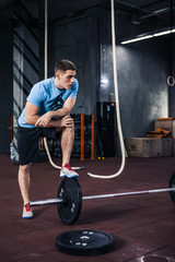 Obraz na płótnie Canvas Young athlete sportsman in gym