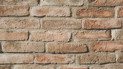 old terracotta brick wall texture background 