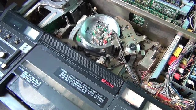 Man start to play a professional VHS video recorder close up