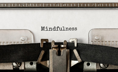 Text Mindfulness typed on retro typewriter